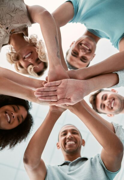 Hands together, support and teamwork people for business collaboration, team building and work moti